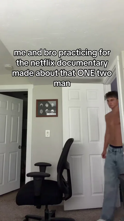 Two friends filming a satirical documentary bit